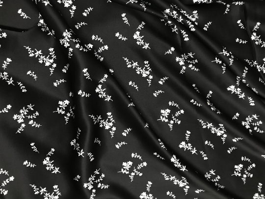 White Small Flowers on Black  Background - Stretch Mulberry Silk Satin - 19 MM - 140 cm Wide.
