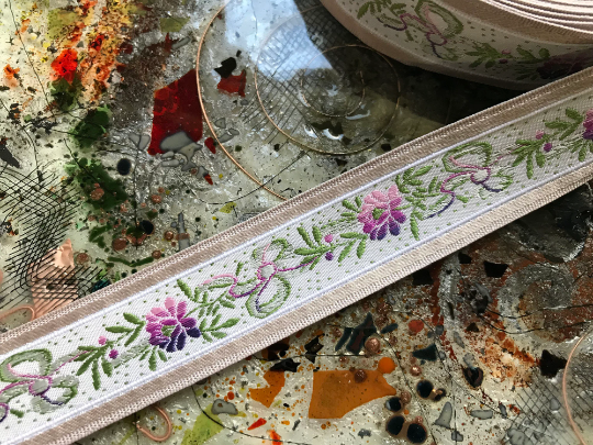Multi Color Floral Print on White Background - Embroidered Jacquard Ribbon - 1.1" Wide.