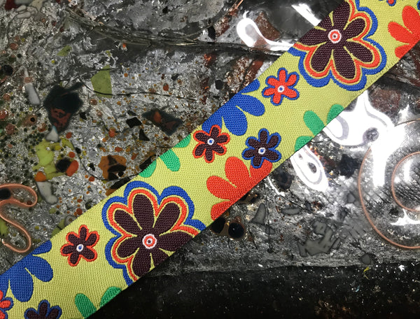 ulti Color Daisies Pattern on  Green Background - Embroidered Jacquard Ribbon - 7/8" Wide.