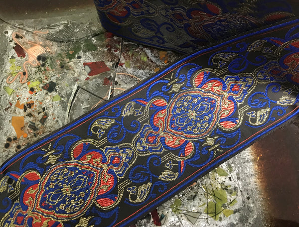 Royal Blue/Tangerine/Gold Filigree on Black Background - Embroidered Jacquard Ribbon - 9 cm Wide.