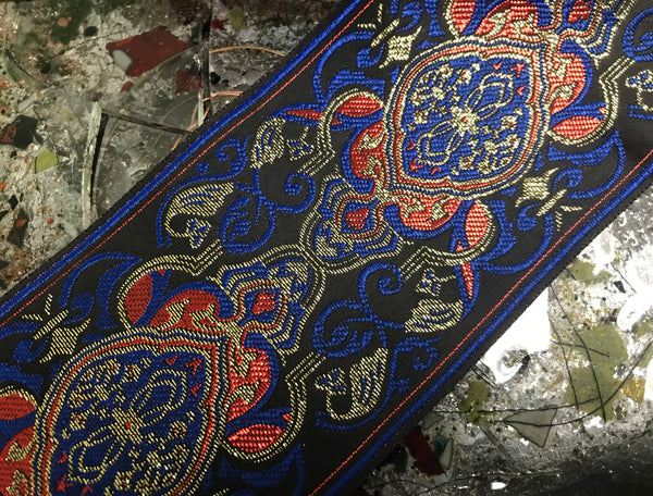 Royal Blue/Tangerine/Gold Filigree on Black Background - Embroidered Jacquard Ribbon - 9 cm Wide.