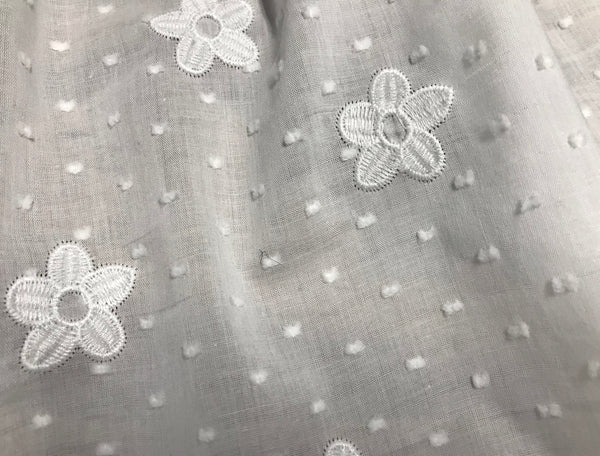 White All Over Embroidery - Broderie Anglaise on SwissWhite All Over Embroidery and Swiss Dot - Broderie Anglaise on Swiss Cotton Voile - 138 cm Wide. Cotton Voile - 138 cm Wide.