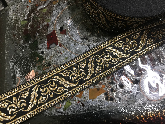 Metallic Gold on Black Background - Embroidered Jacquard Ribbon - 1 3/8" Wide.