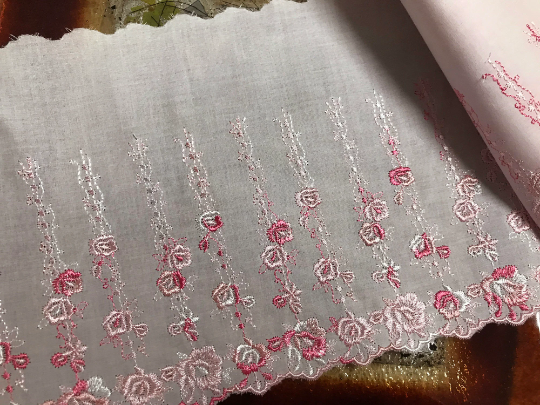 Hombre Pink Embroidery on Light Pink Background _ Swiss Cotton Voile Lace_ 20 cm Wide.