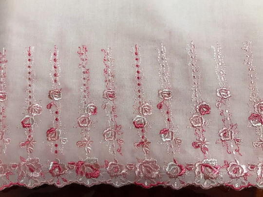 Hombre Pink Embroidery on Light Pink Background _ Swiss Cotton Voile Lace_ 20 cm Wide.