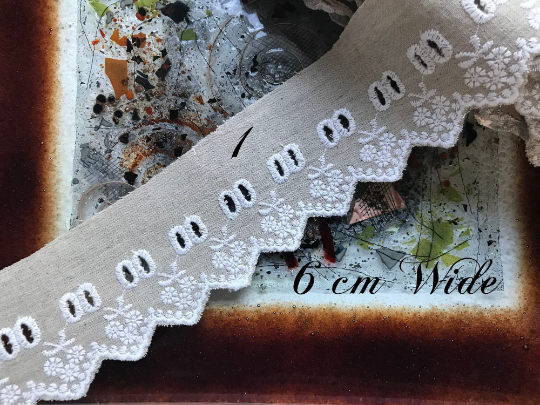 White Embroidery on Beige Color Linen.