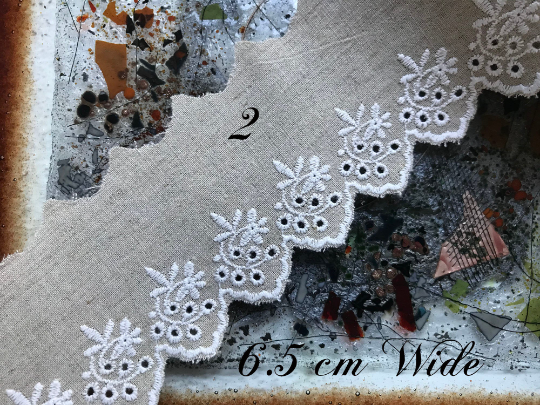 White Embroidery on Beige Color Linen.