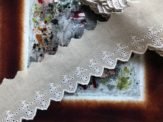 White Embroidery on Beige Color Linen.